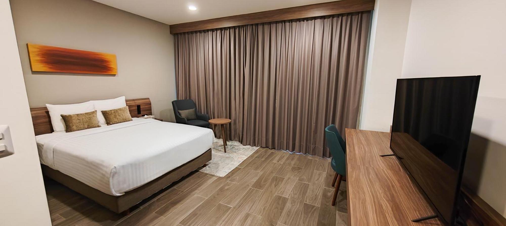 Fujitaya Queretaro Hotel Jurica Luaran gambar A bedroom at the hotel